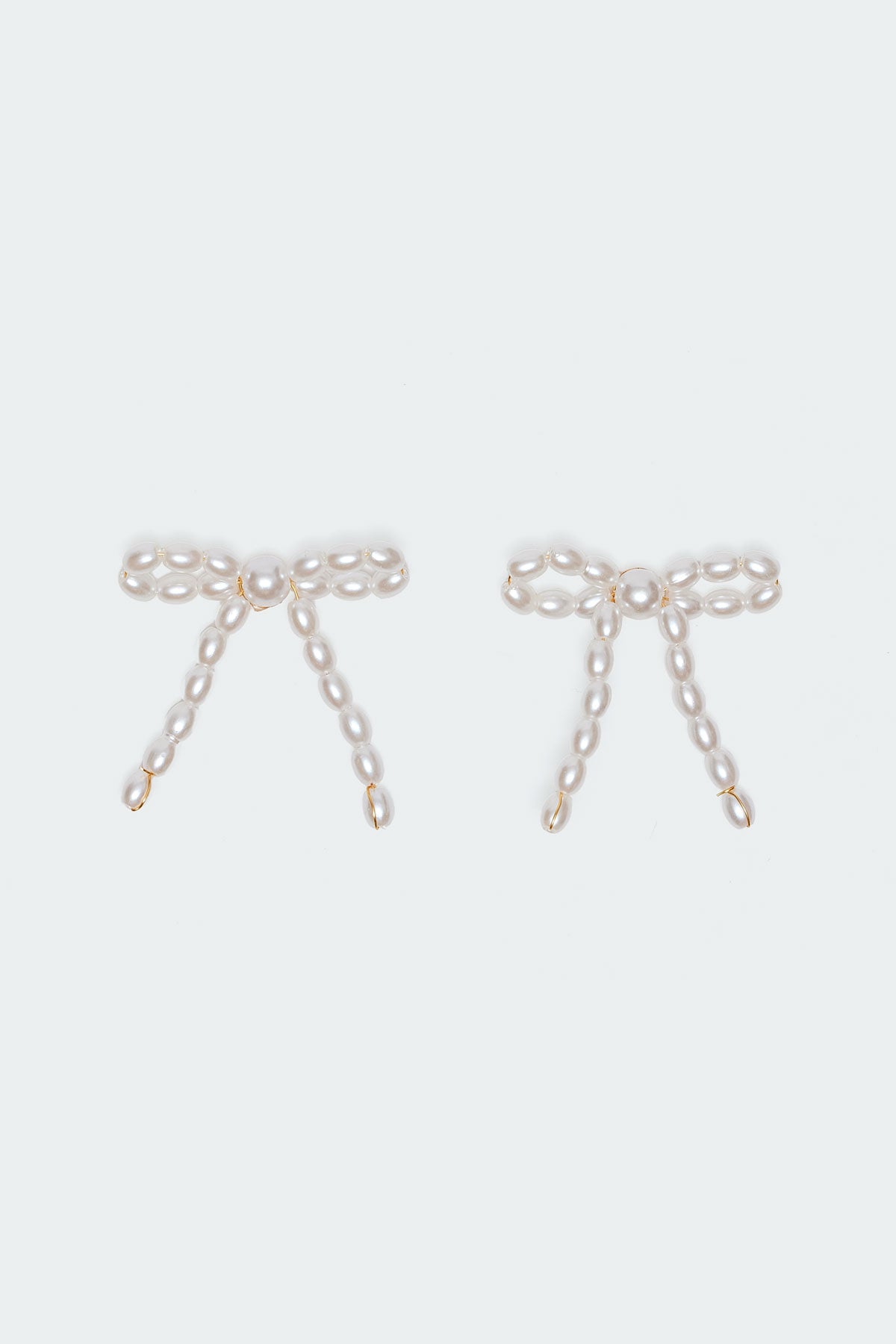 Pearl Bow Stud Earrings - Image 2